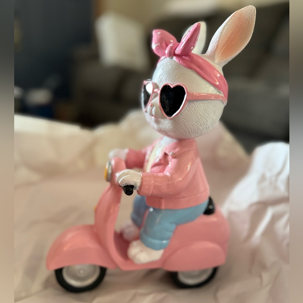 Easter Bunny Girl with Sunglasses and Pink Bow on Scooter Figurine. 11” T